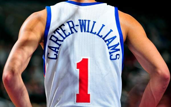 Rookie Michael Carter-Williams helped Philadelphia evade the title of NBA's losingest team in history. (David Dow/Getty Images)